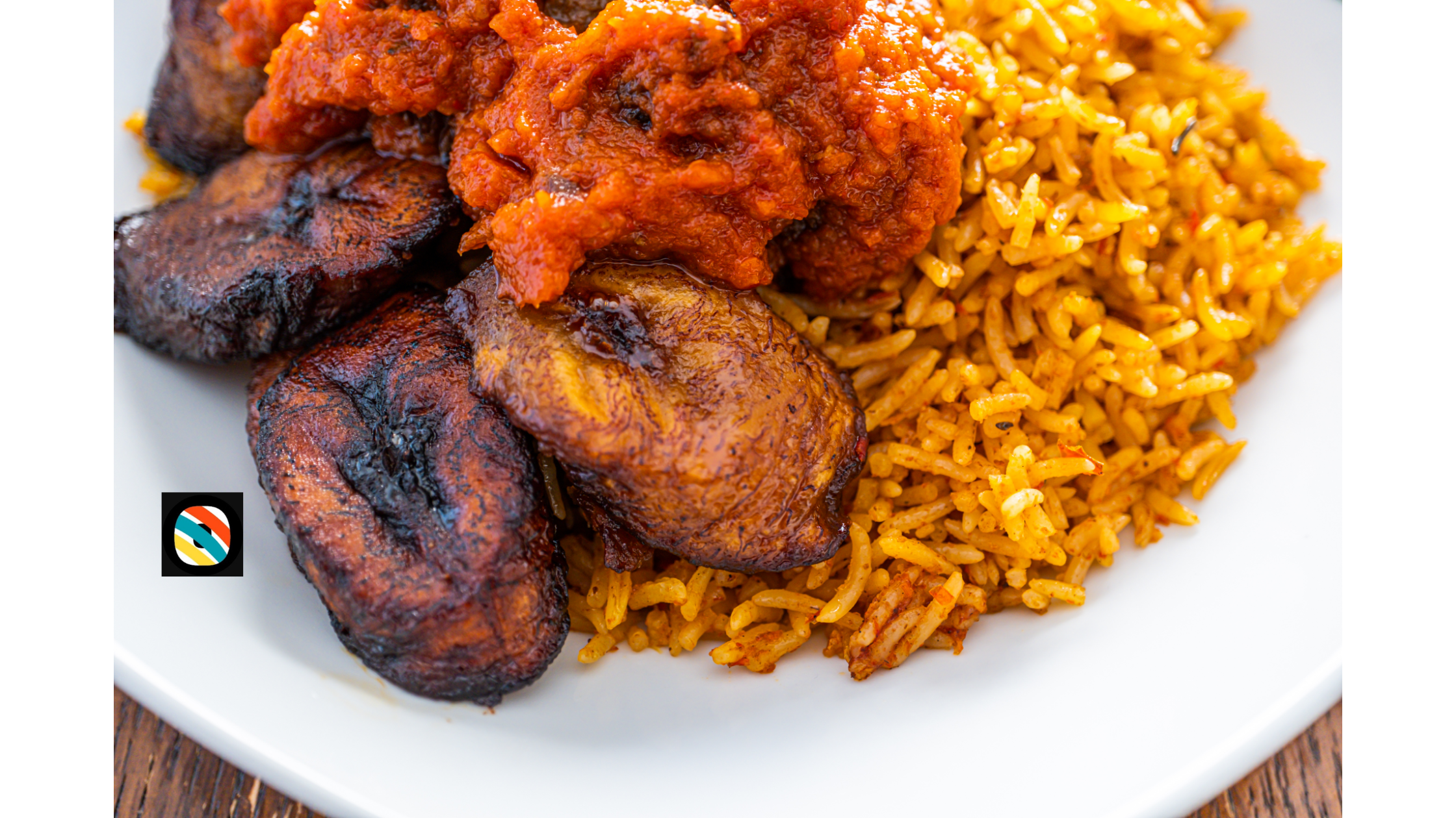 Nigerian jollof rice served with plantain